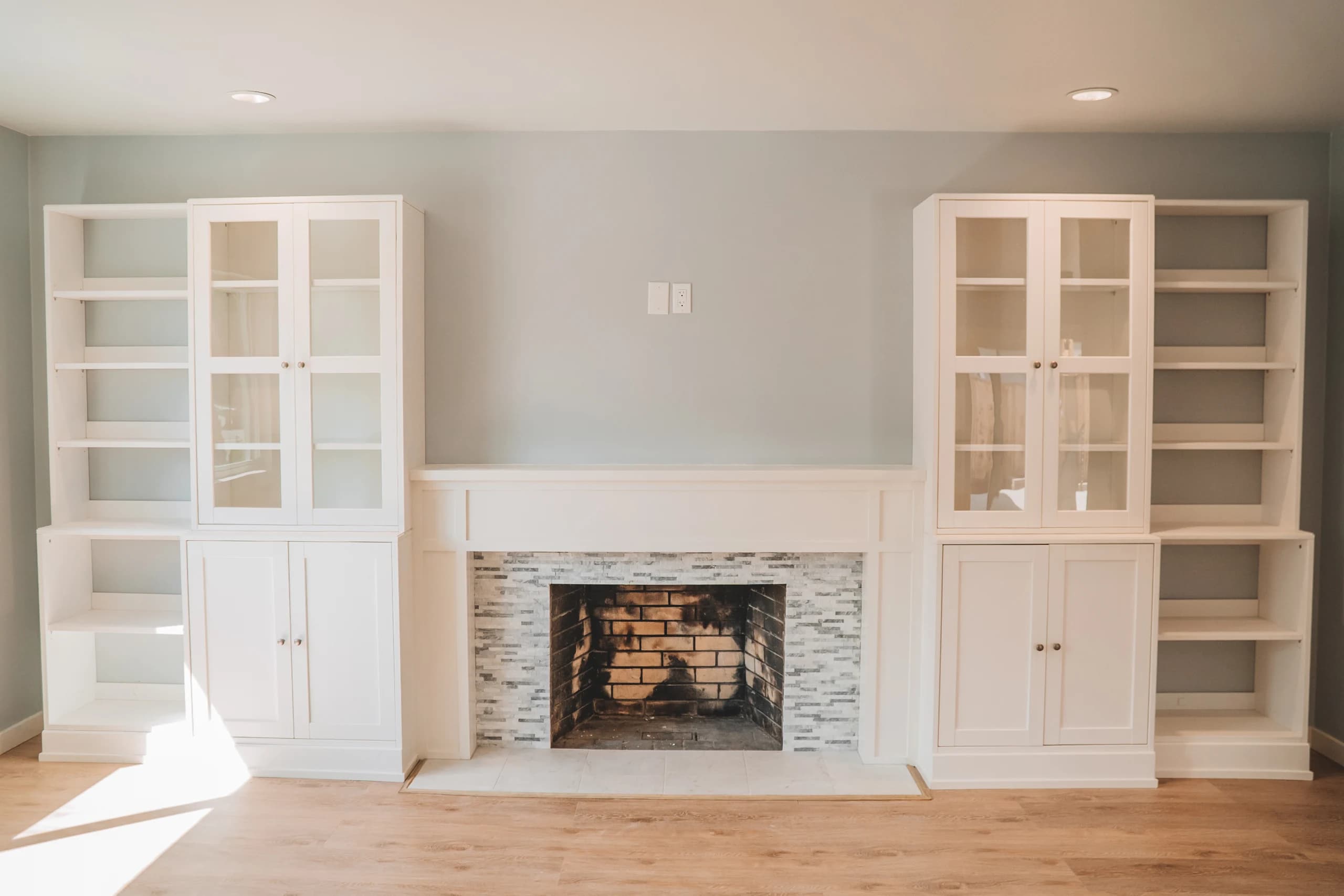 Living room with custom built-ins and fireplace